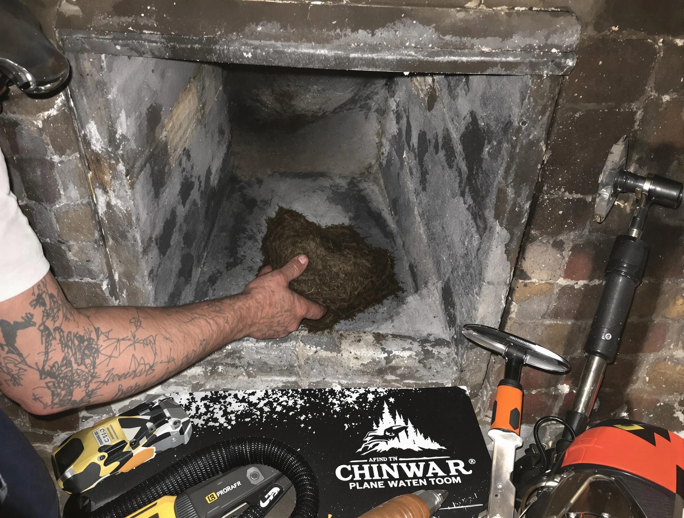 Moody Chimney Sweep safely removing debris and screening chimney in Moody, AL